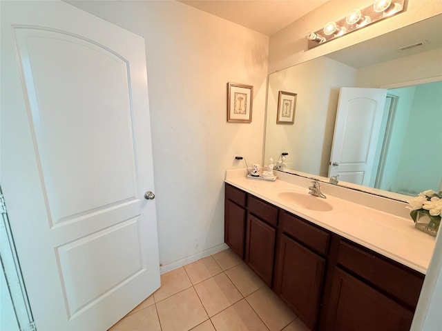 9458 Grand Spark Dr, Rosharon, TX 77583 - bathroom with vanity and tile patterned flooring