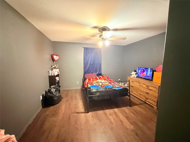 9458 Grand Spark Dr, Rosharon, TX 77583 - bedroom featuring wood finished floors and ceiling fan