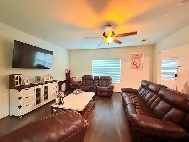 9458 Grand Spark Dr, Rosharon, TX 77583 - living room featuring a ceiling fan and dark wood-style floors