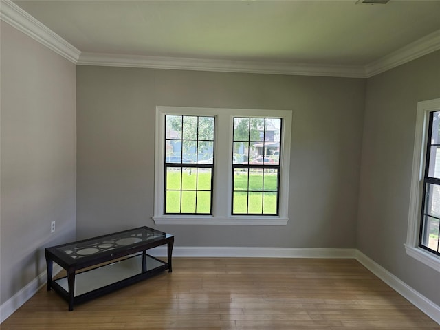 604 N Main St, Galena Park, TX 77547 - unfurnished room with ornamental molding and wood finished floors