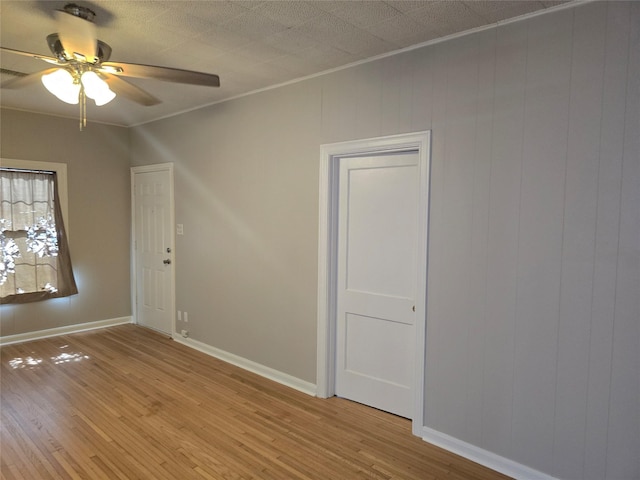 604 N Main St, Galena Park, TX 77547 - unfurnished room with a ceiling fan, light wood finished floors, and ornamental molding