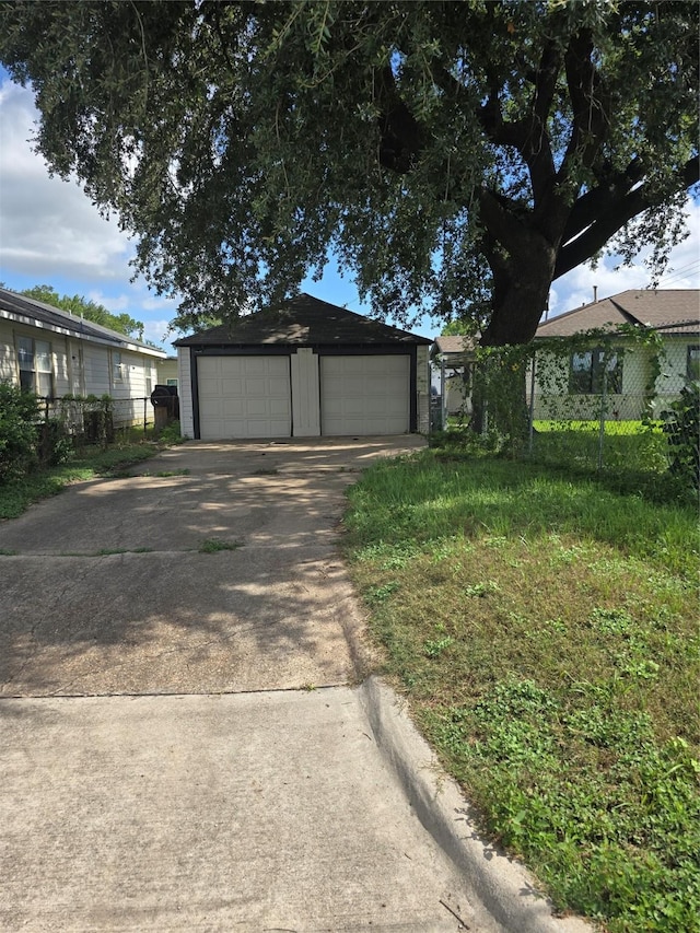 604 N Main St, Galena Park, TX 77547 - detached garage featuring concrete driveway