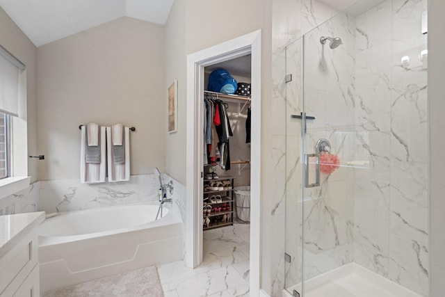 22731 Willhanna Dr, Katy, TX 77449 - bathroom featuring a bath, a marble finish shower, marble finish flooring, a spacious closet, and vanity