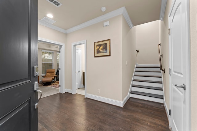 2623 Shady Woods Ln, Houston, TX 77008 - entrance foyer with crown molding, dark wood-style floors, stairway, and recessed lighting