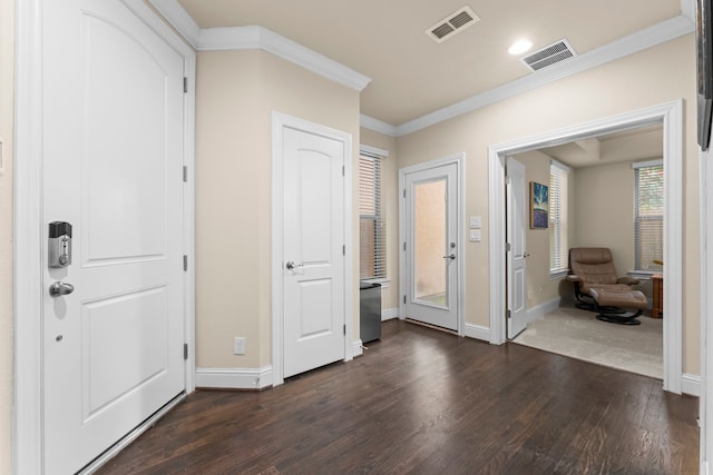 2623 Shady Woods Ln, Houston, TX 77008 - entrance foyer with dark wood-style floors, crown molding, and recessed lighting
