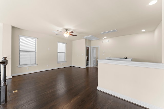 2623 Shady Woods Ln, Houston, TX 77008 - unfurnished living room featuring attic access, ceiling fan, and dark wood finished floors