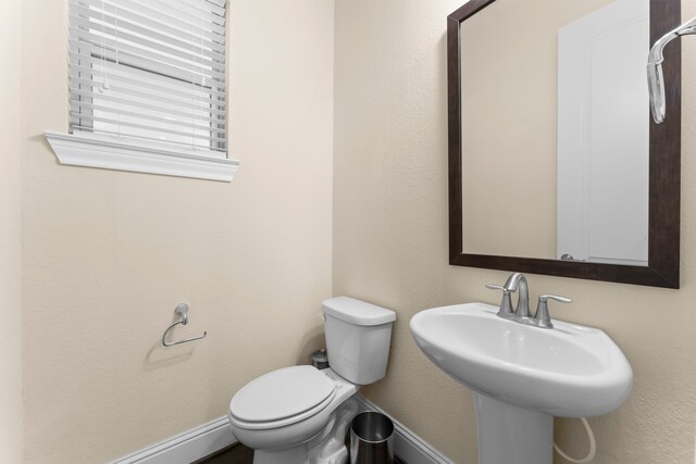 2623 Shady Woods Ln, Houston, TX 77008 - bathroom featuring a baseboard heating unit and a sink