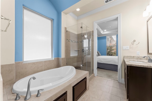 2623 Shady Woods Ln, Houston, TX 77008 - ensuite bathroom with a shower stall, crown molding, a garden tub, vanity, and recessed lighting
