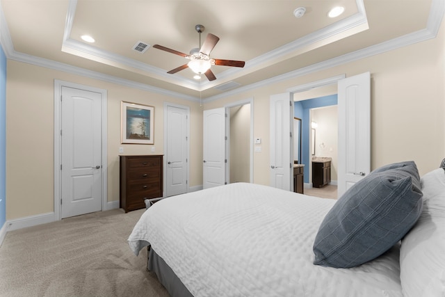 2623 Shady Woods Ln, Houston, TX 77008 - bedroom with a raised ceiling, ornamental molding, light carpet, ceiling fan, and connected bathroom