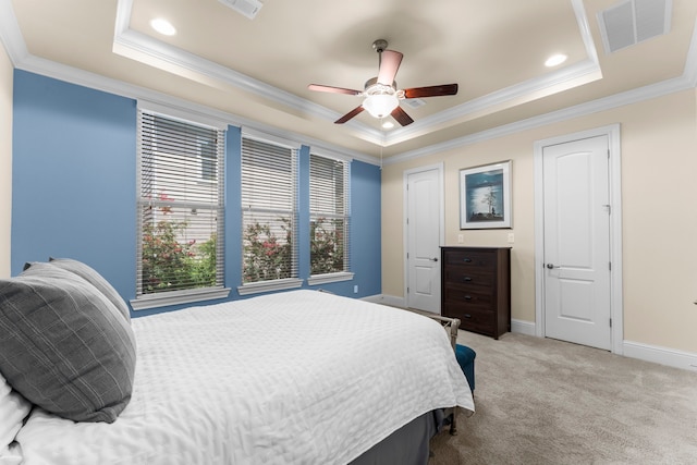 2623 Shady Woods Ln, Houston, TX 77008 - bedroom with a tray ceiling, ornamental molding, carpet, and a ceiling fan