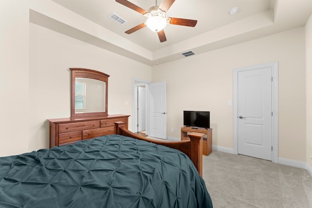 2623 Shady Woods Ln, Houston, TX 77008 - bedroom featuring a raised ceiling, light carpet, and ceiling fan