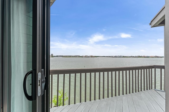 2816 Lighthouse Dr, Houston, TX 77058 - wooden terrace with a water view and a lawn