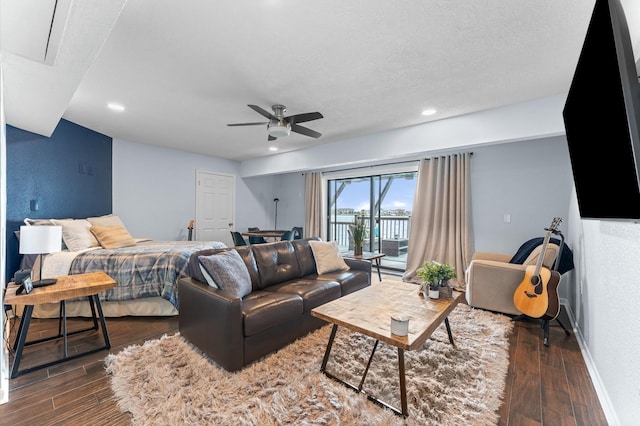 2816 Lighthouse Dr, Houston, TX 77058 - living room with dark wood-style flooring, a ceiling fan, and recessed lighting