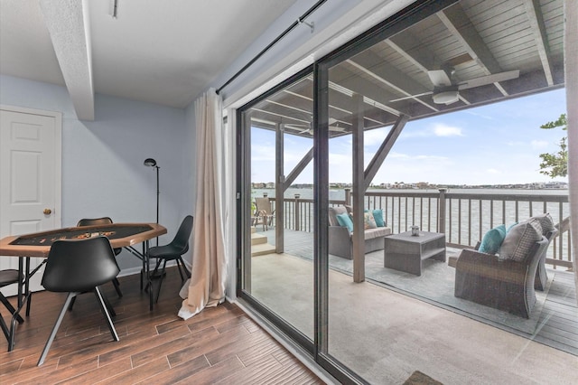 2816 Lighthouse Dr, Houston, TX 77058 - balcony with a ceiling fan, a water view, and an outdoor hangout area