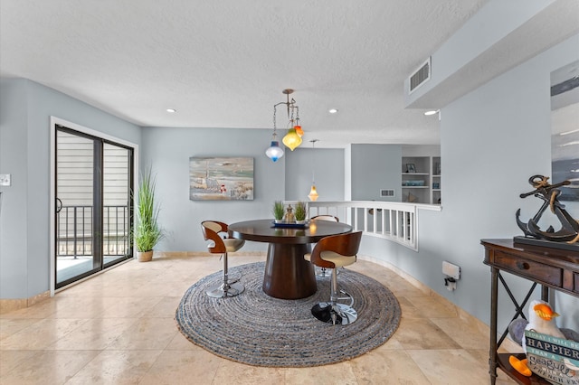 2816 Lighthouse Dr, Houston, TX 77058 - dining room with a textured ceiling and recessed lighting