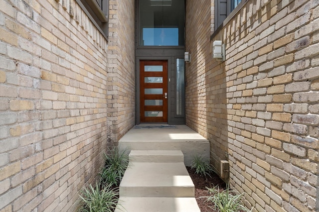 2816 Lighthouse Dr, Houston, TX 77058 - doorway to property featuring brick siding