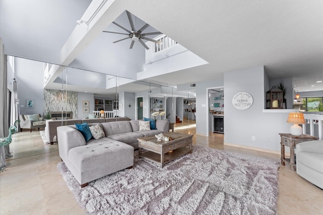 2816 Lighthouse Dr, Houston, TX 77058 - living room featuring ceiling fan and light tile patterned floors