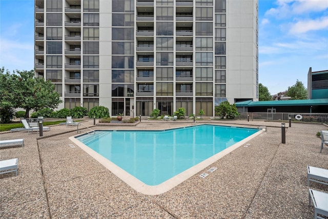 1111 Bering Dr Unit 1001, Houston, TX 77057 - community pool featuring a patio area