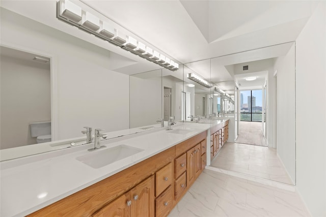 1111 Bering Dr Unit 1001, Houston, TX 77057 - full bathroom with marble finish flooring and double vanity
