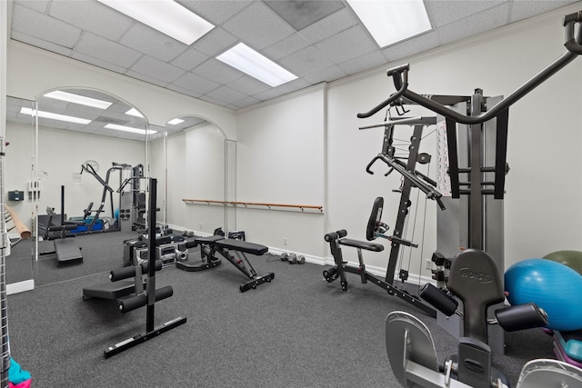 1111 Bering Dr Unit 1001, Houston, TX 77057 - workout area with a paneled ceiling