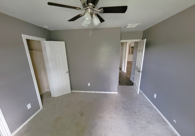 3301 Clover Hill Ln, Texas City, TX 77591 - unfurnished bedroom featuring carpet, ceiling fan, and a closet