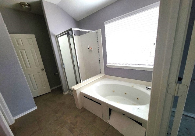 3301 Clover Hill Ln, Texas City, TX 77591 - full bath with a stall shower, a jetted tub, and tile patterned flooring