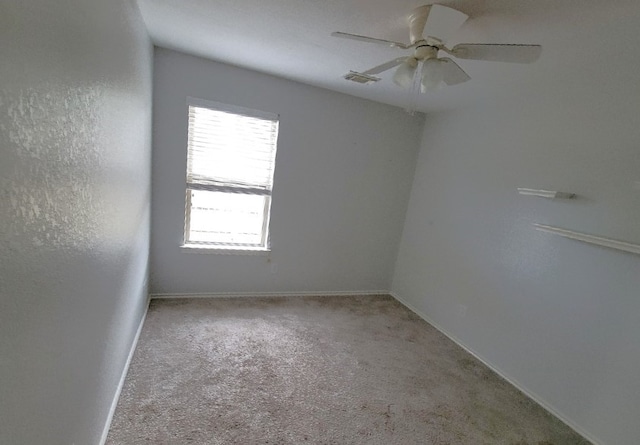 3301 Clover Hill Ln, Texas City, TX 77591 - carpeted spare room featuring a ceiling fan and baseboards