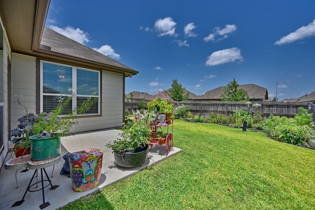 1009 Old Vine, Brenham, TX 77833 - fenced backyard with a patio area