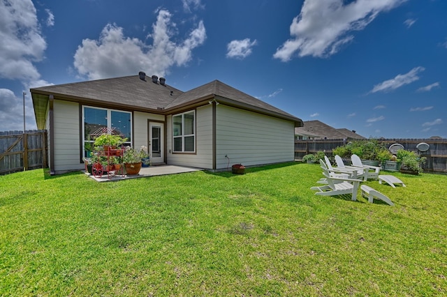 1009 Old Vine, Brenham, TX 77833 - back of house with a fenced backyard and a patio