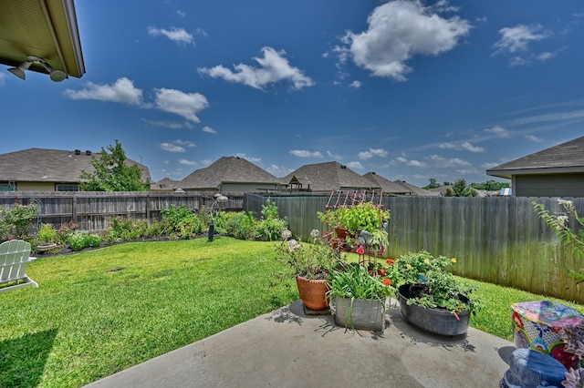 1009 Old Vine, Brenham, TX 77833 - fenced backyard with a patio area
