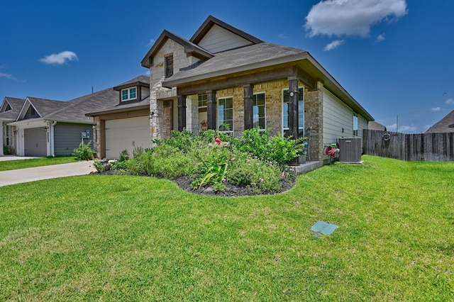 1009 Old Vine, Brenham, TX 77833 - view of front of home with concrete driveway and stone siding