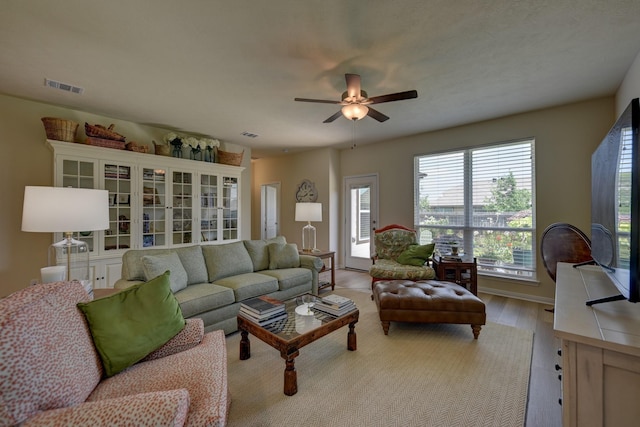 1009 Old Vine, Brenham, TX 77833 - living room with a ceiling fan and light wood-style floors