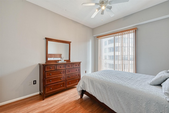 3505 Sage Rd Unit 1206, Houston, TX 77056 - bedroom featuring light wood-type flooring and ceiling fan
