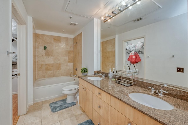 3505 Sage Rd Unit 1206, Houston, TX 77056 - bathroom with double vanity, tub / shower combination, a walk in closet, and tile patterned floors