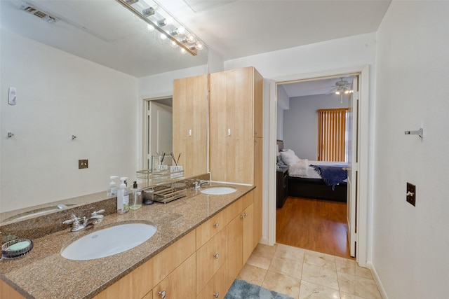 3505 Sage Rd Unit 1206, Houston, TX 77056 - ensuite bathroom featuring double vanity and a ceiling fan
