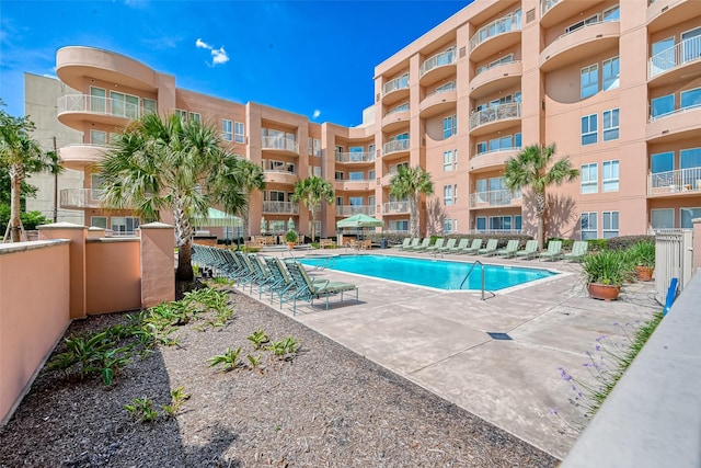 3505 Sage Rd Unit 1206, Houston, TX 77056 - community pool featuring a patio