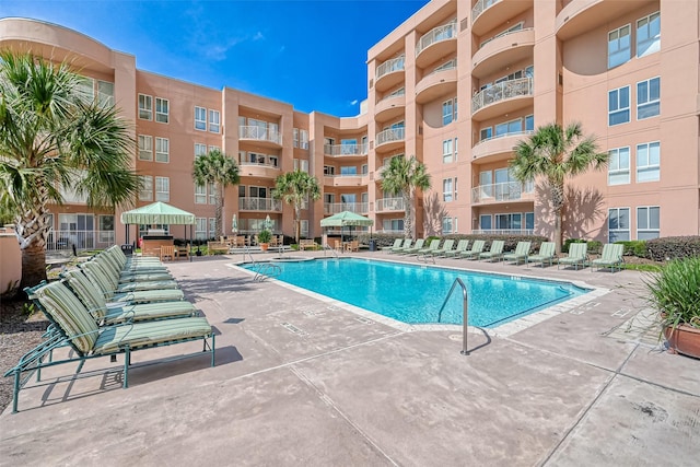 3505 Sage Rd Unit 1206, Houston, TX 77056 - community pool featuring a patio