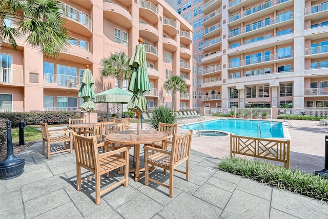 3505 Sage Rd Unit 1206, Houston, TX 77056 - community pool featuring a patio