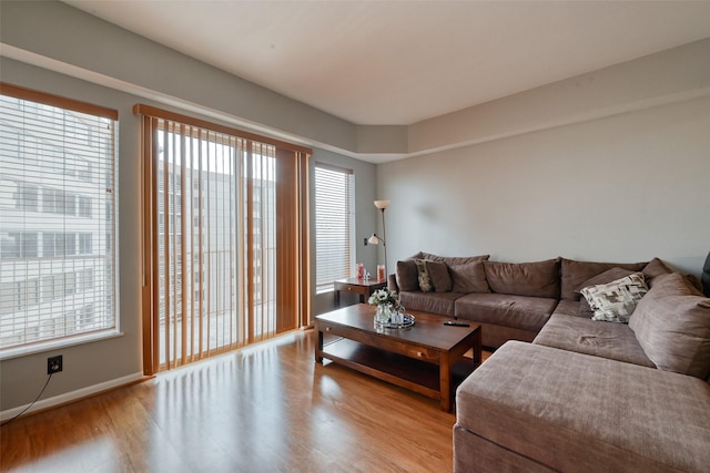 3505 Sage Rd Unit 1206, Houston, TX 77056 - living area with light wood-style floors and baseboards