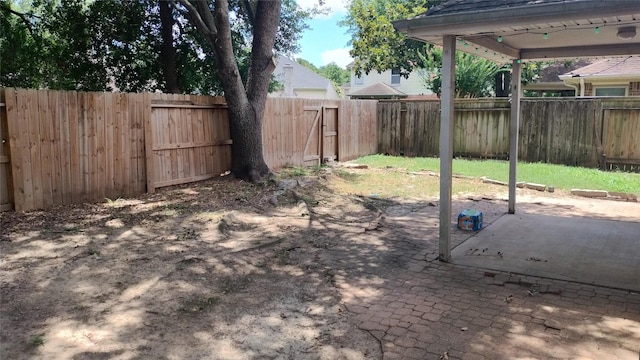 11718 Emerald Wood Dr, Houston, TX 77070 - fenced backyard featuring a patio area
