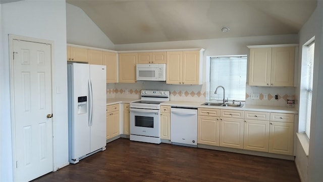 11718 Emerald Wood Dr, Houston, TX 77070 - kitchen with white appliances, plenty of natural light, vaulted ceiling, tasteful backsplash, and light countertops