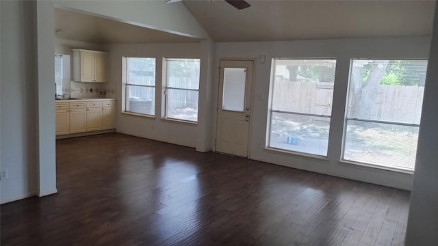 11718 Emerald Wood Dr, Houston, TX 77070 - unfurnished living room featuring ceiling fan, plenty of natural light, dark wood-type flooring, and lofted ceiling