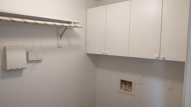 11718 Emerald Wood Dr, Houston, TX 77070 - washroom featuring hookup for a washing machine and cabinet space