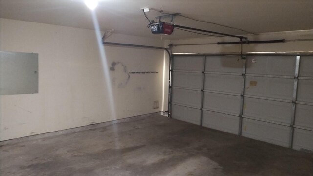 11718 Emerald Wood Dr, Houston, TX 77070 - garage featuring a garage door opener