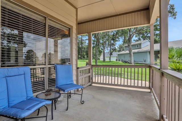 63 Harbour Row Dr, Coldspring, TX 77331 - porch featuring a lawn