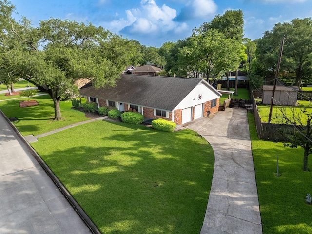 3405 Randall St, Pearland, TX 77581 - view of front facade with concrete driveway, a garage, and brick siding