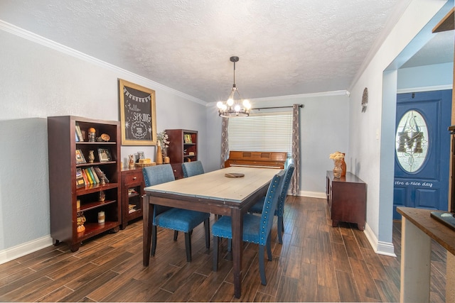 3405 Randall St, Pearland, TX 77581 - dining area with a chandelier, dark wood-style flooring, a textured ceiling, and ornamental molding