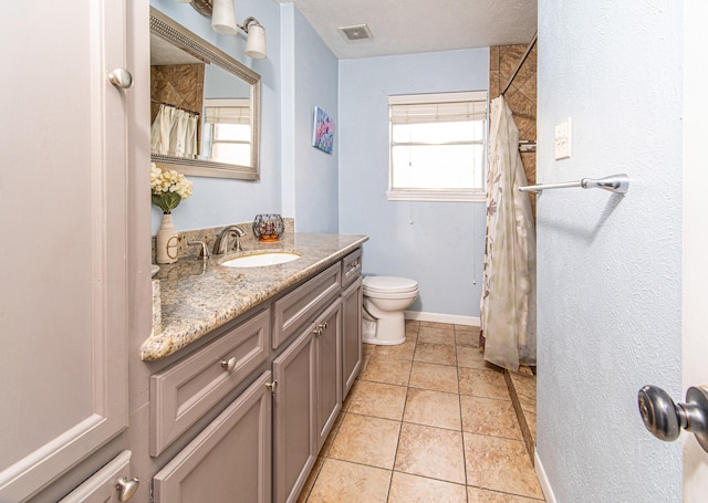 3405 Randall St, Pearland, TX 77581 - full bath with vanity, tile patterned floors, and a shower with curtain