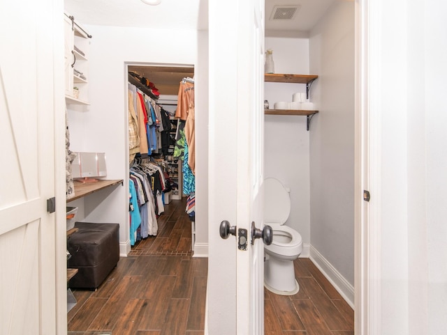 3405 Randall St, Pearland, TX 77581 - bathroom featuring wood finished floors and a walk in closet