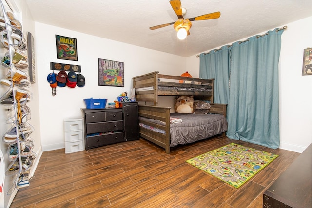 3405 Randall St, Pearland, TX 77581 - bedroom featuring wood finished floors, ceiling fan, and a textured ceiling